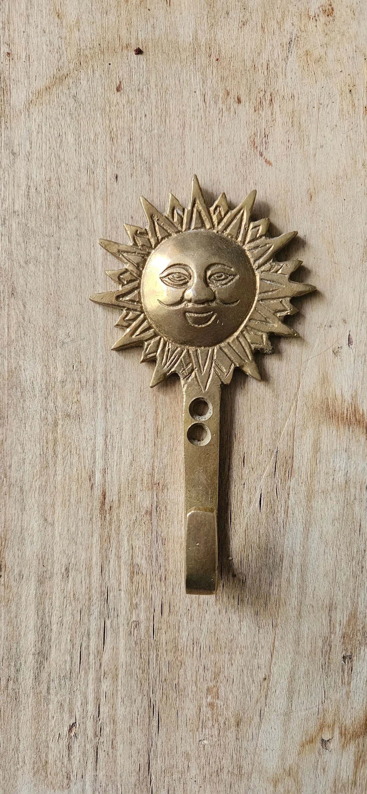 Patere en bronze soleil