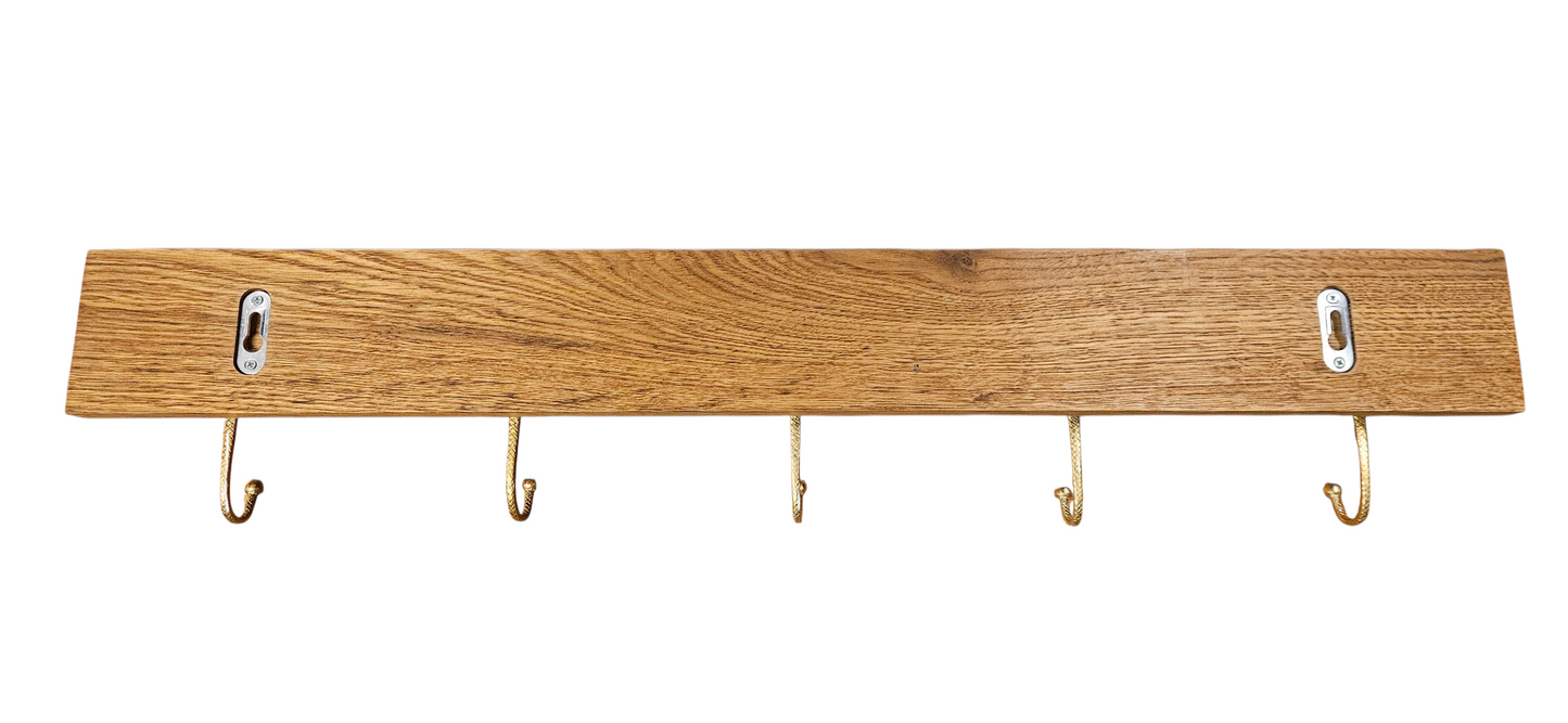 Porte-manteaux murale en bronze sur une planche de chêne 5 crochets Tokolausanne
