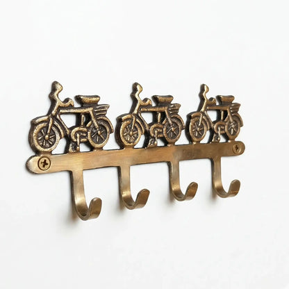 Porte-manteau mural vintage en bronze avec vélos! - TokoLausanne