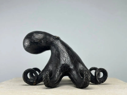 Sculpture de pieuvre stylisée en bronze patiné TokoLausanne 