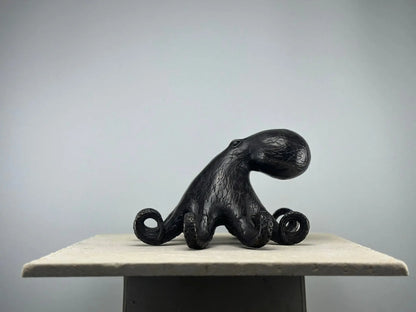 Sculpture de pieuvre stylisée en bronze patiné TokoLausanne 