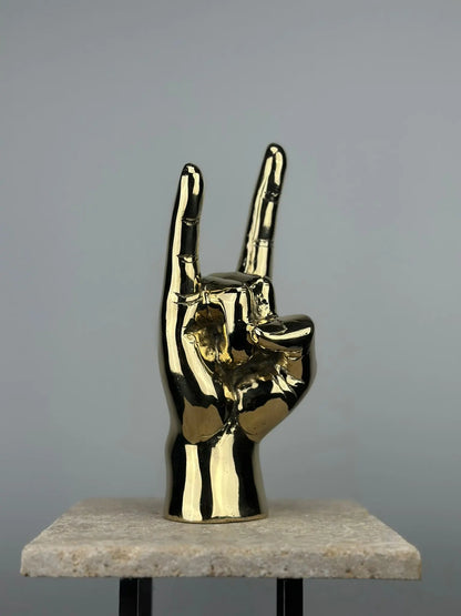 Sculpture de main rock en bronze doré TokoLausanne 