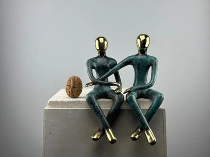 Sculpture du couple assis en bronze TokoLausanne 