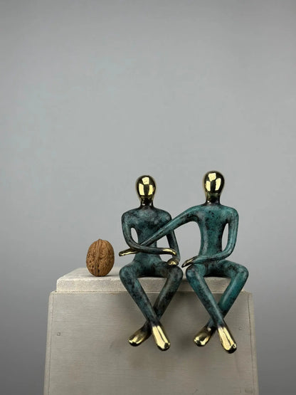 Sculpture du couple assis en bronze TokoLausanne 