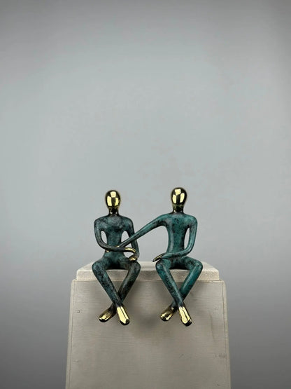 Sculpture du couple assis en bronze TokoLausanne 