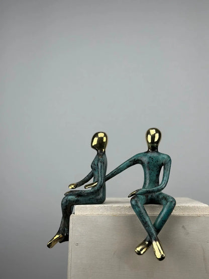 Sculpture du couple assis en bronze TokoLausanne 