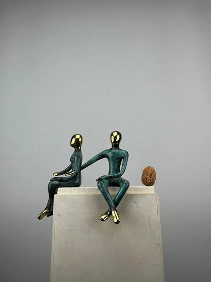 Sculpture du couple assis en bronze TokoLausanne 