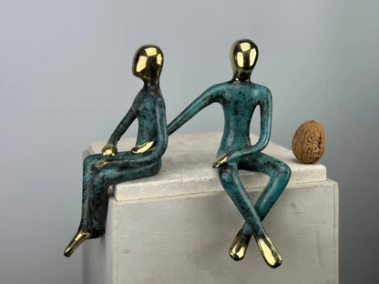 Sculpture du couple assis en bronze TokoLausanne 