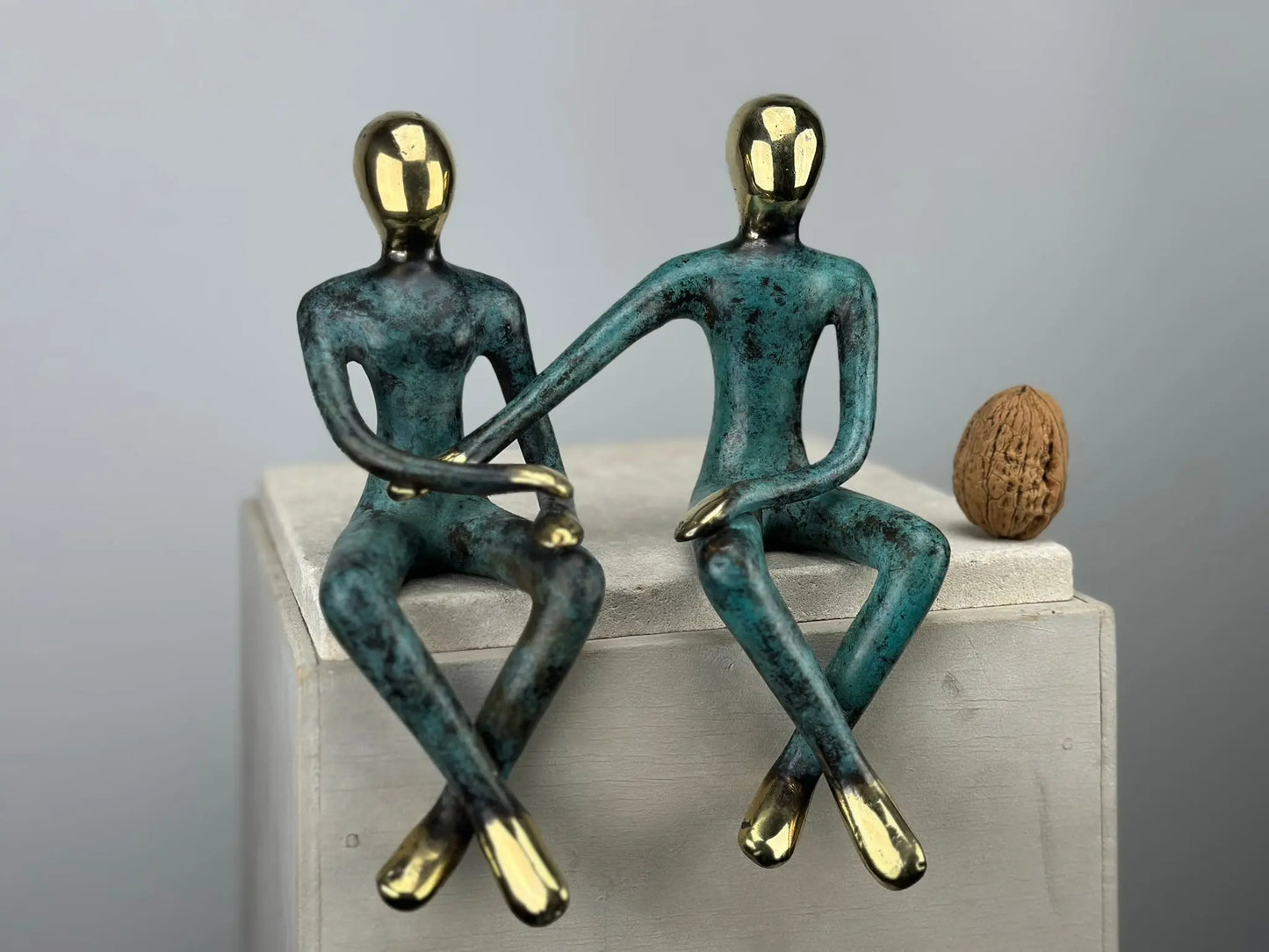 Sculpture du couple assis en bronze TokoLausanne 