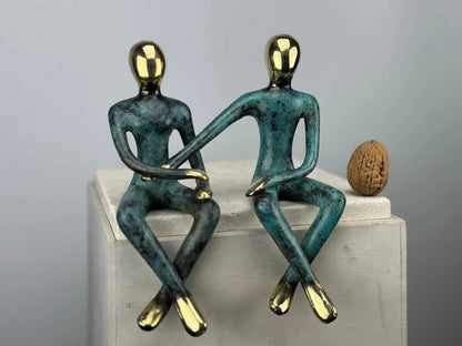 Sculpture du couple assis en bronze TokoLausanne 