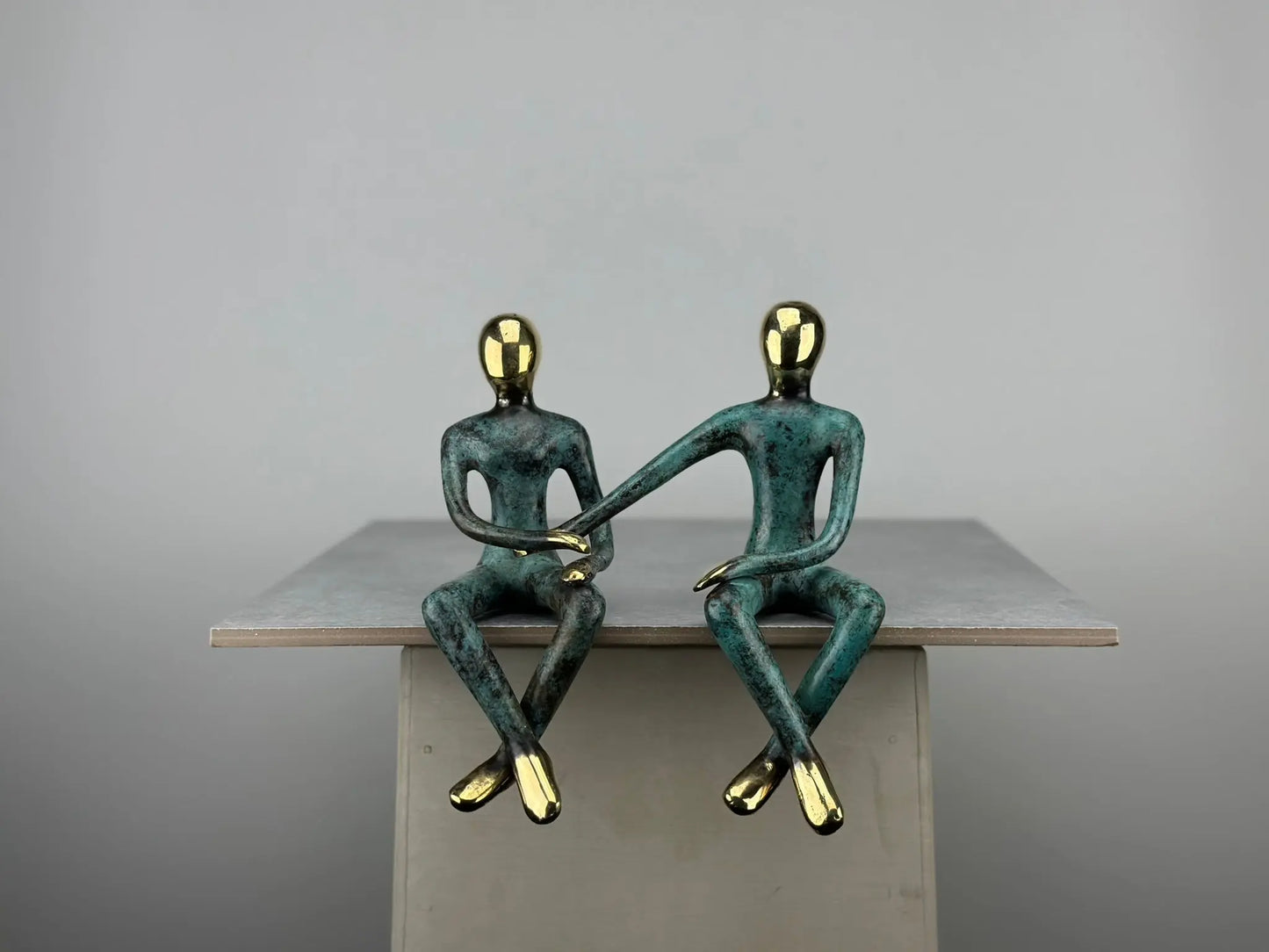 Sculpture du couple assis en bronze TokoLausanne 