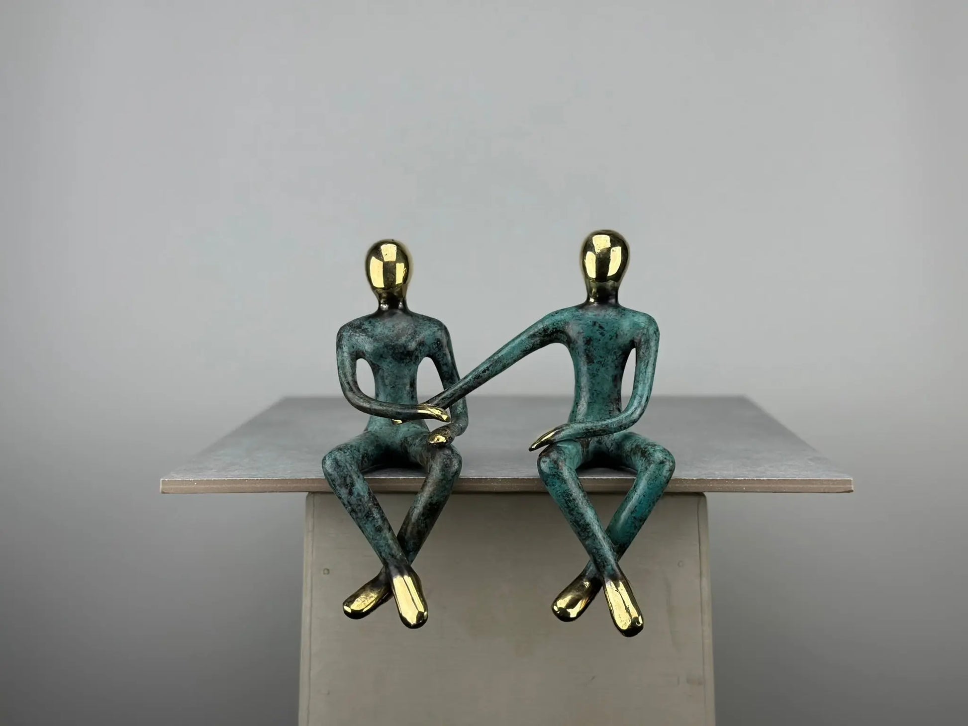 Sculpture du couple assis en bronze TokoLausanne 