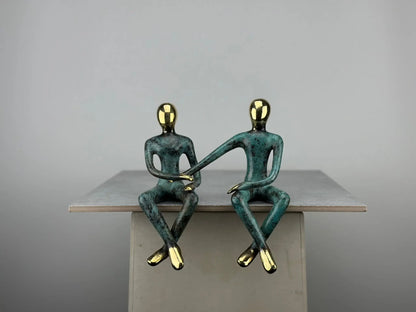 Sculpture du couple assis en bronze TokoLausanne 