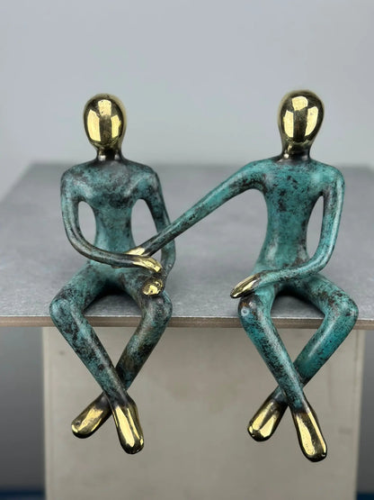 Sculpture du couple assis en bronze TokoLausanne 