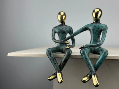 Sculpture du couple assis en bronze TokoLausanne 