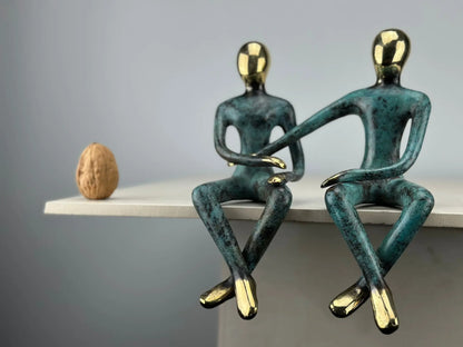 Sculpture du couple assis en bronze TokoLausanne 