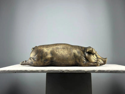Cochon allongé en bronze TokoLausanne 