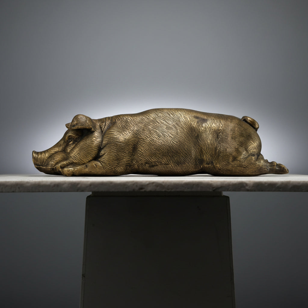 Cochon allongé en bronze TokoLausanne 