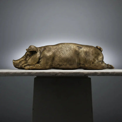 Cochon allongé en bronze TokoLausanne 