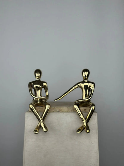 Sculpture du couple assis en bronze doré