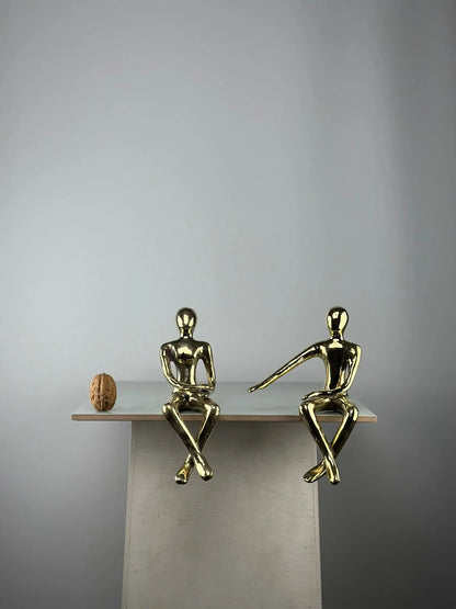 Sculpture du couple assis en bronze doré