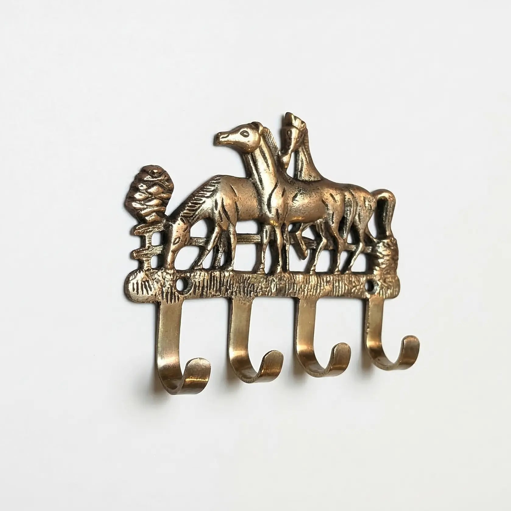 Porte-manteau vintage en bronze avec des chevaux. - TokoLausanne