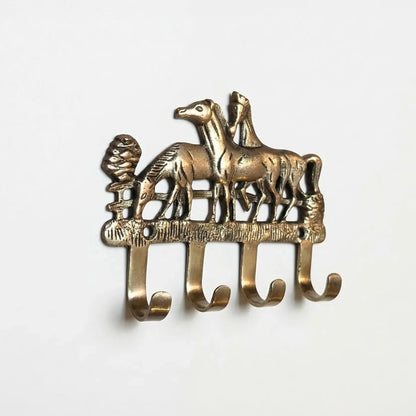 Porte-manteau vintage en bronze avec des chevaux. - TokoLausanne