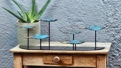 Sculpture en Bronze : Banc de Raies Manta en Vol Tokolausanne