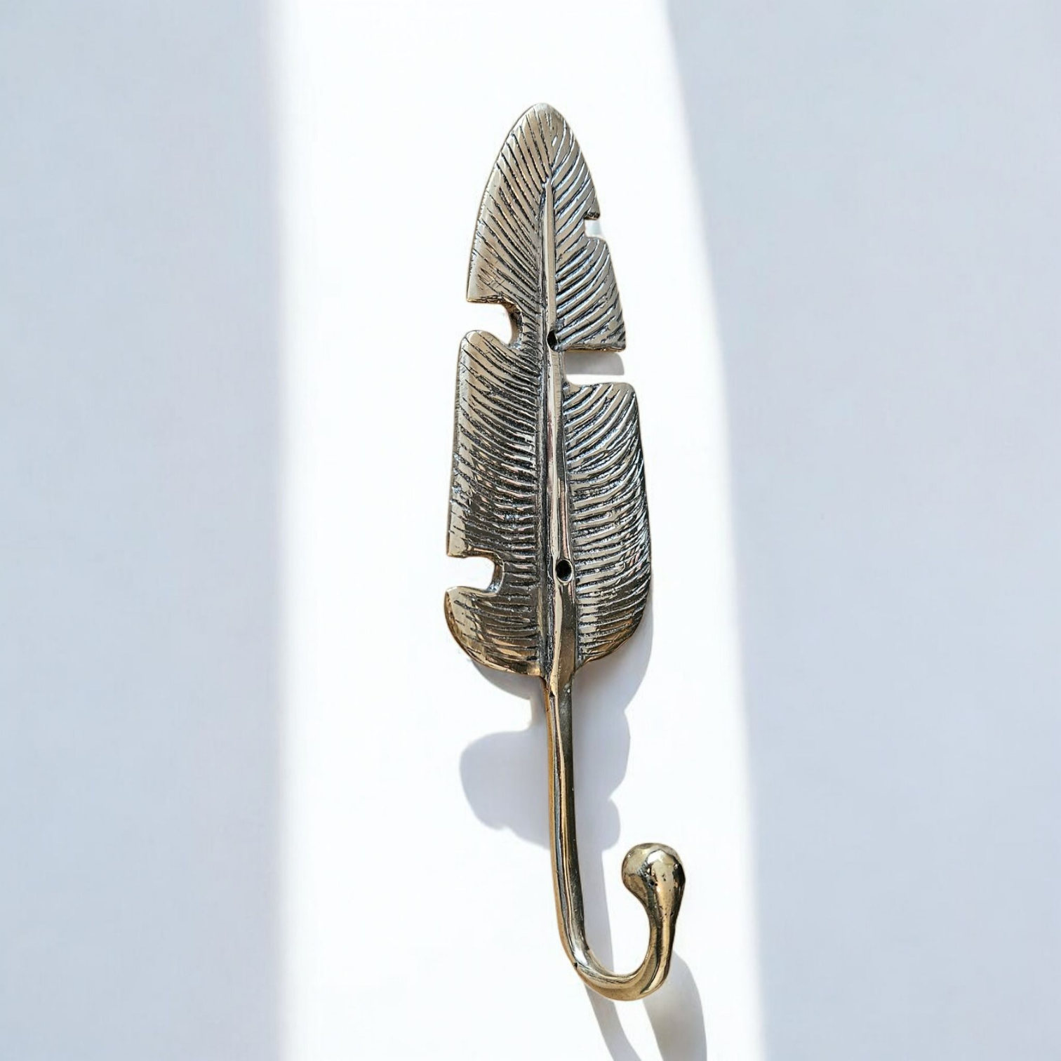 Crochet murale en forme de feuille de bananier, en bronze Tokolausanne